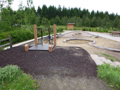 Entrance to the playground with various surface materials